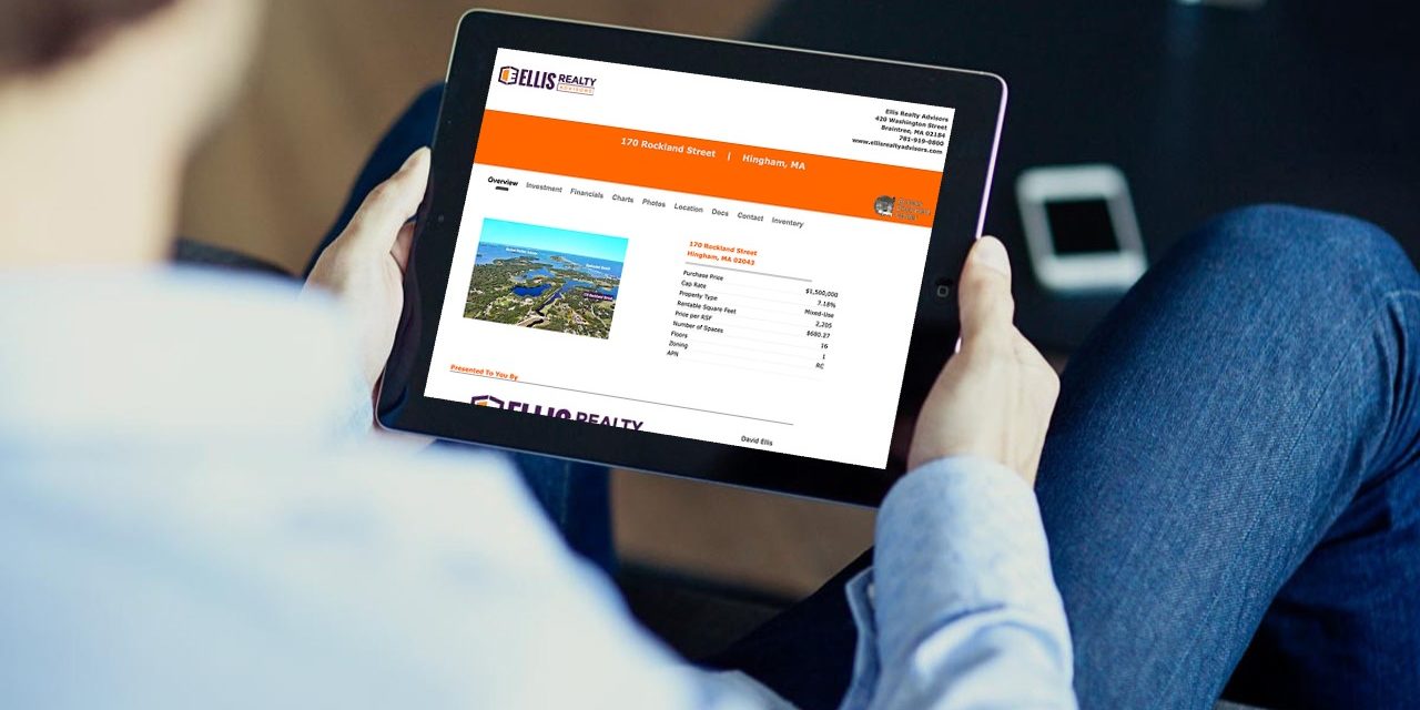 dealroom-mockup Man accessing Deal Room Commercial Real Estate Investment Software on tablet